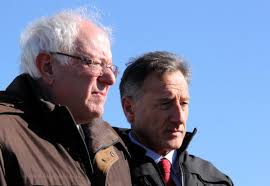 Is Bernie standing on a box?