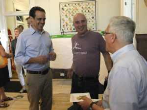 The candidate works the room. 